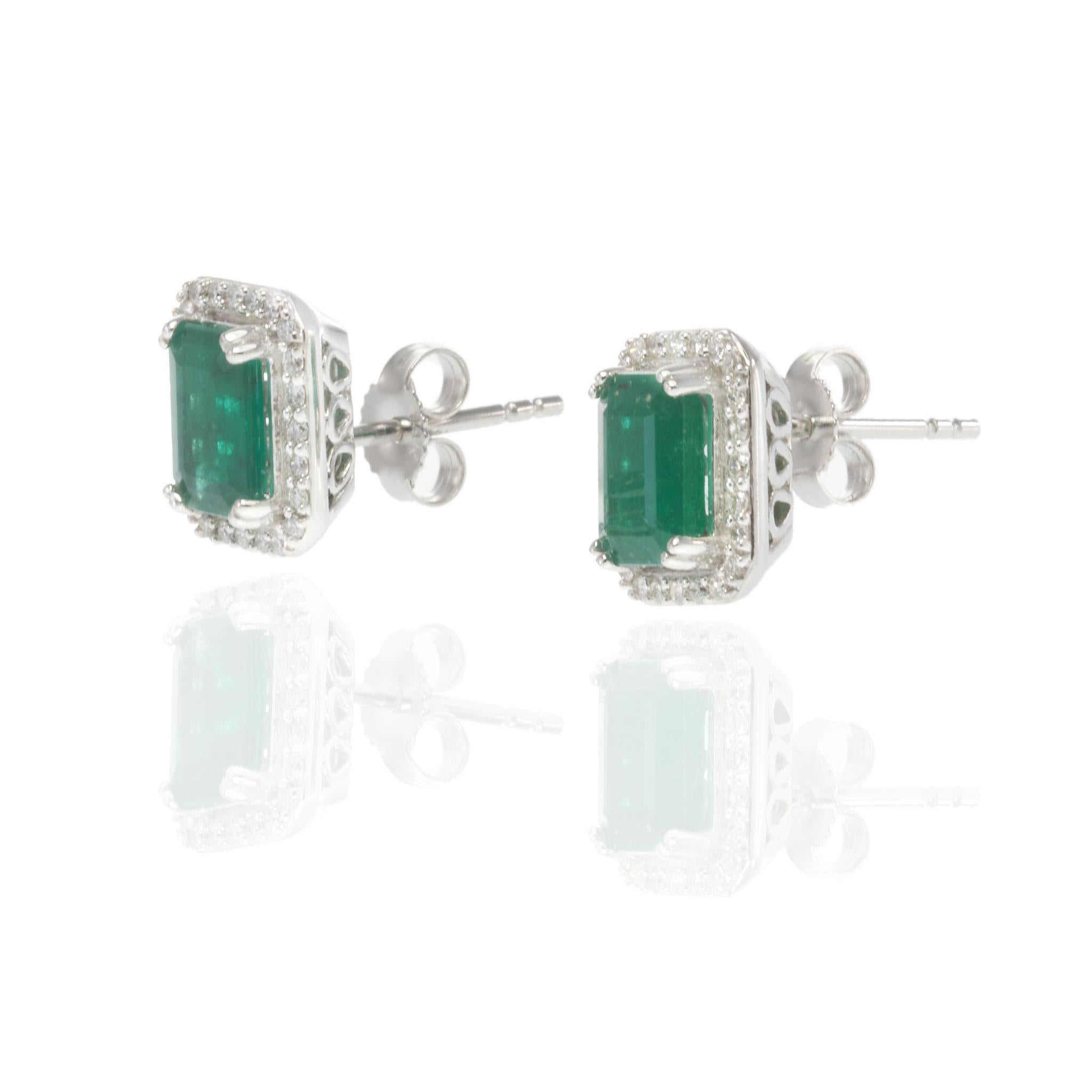 14KT White Gold Emerald Cut Emerald and Diamond Halo Stud Earrings