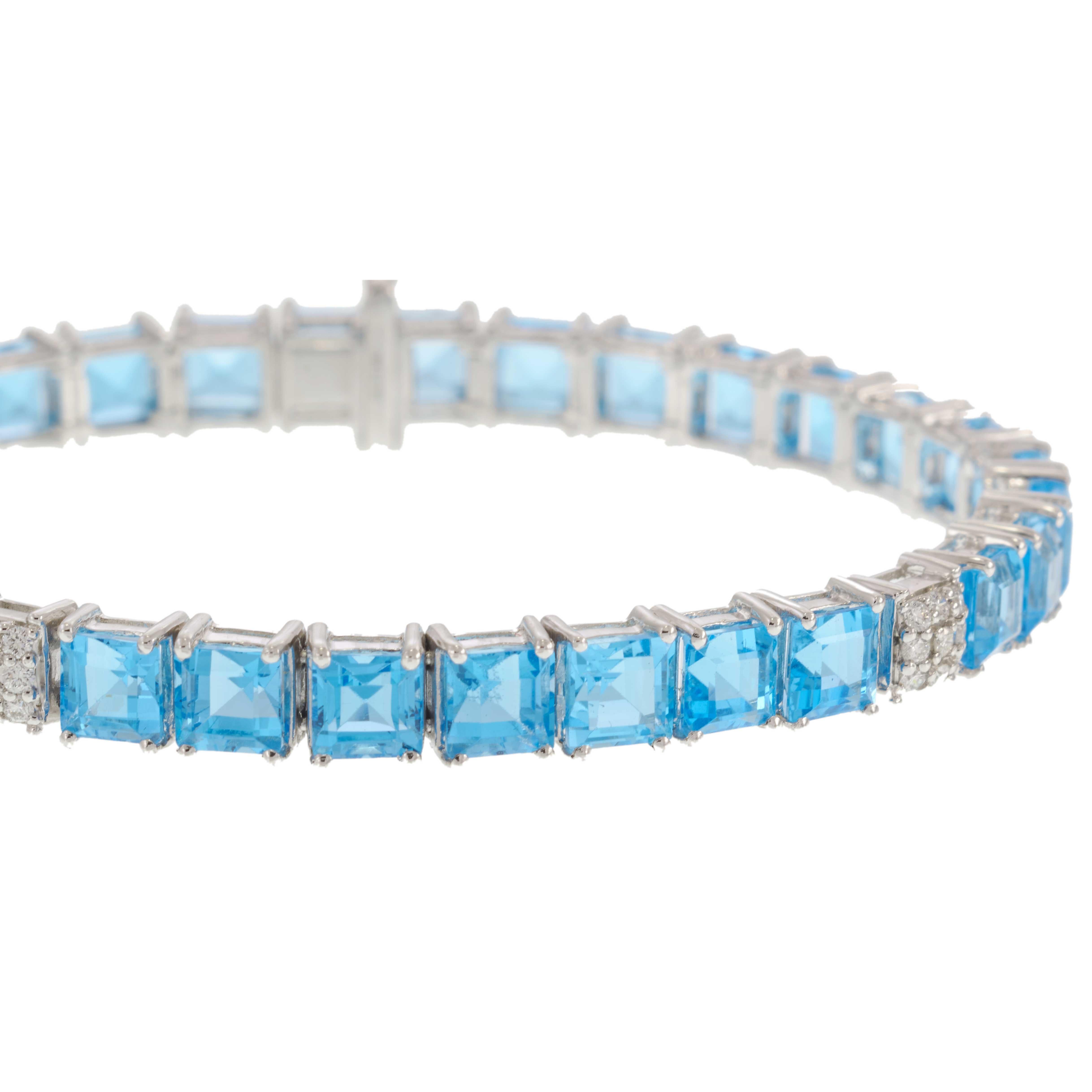 Platinum Blue Topaz & Diamond Straight Line Bracelet