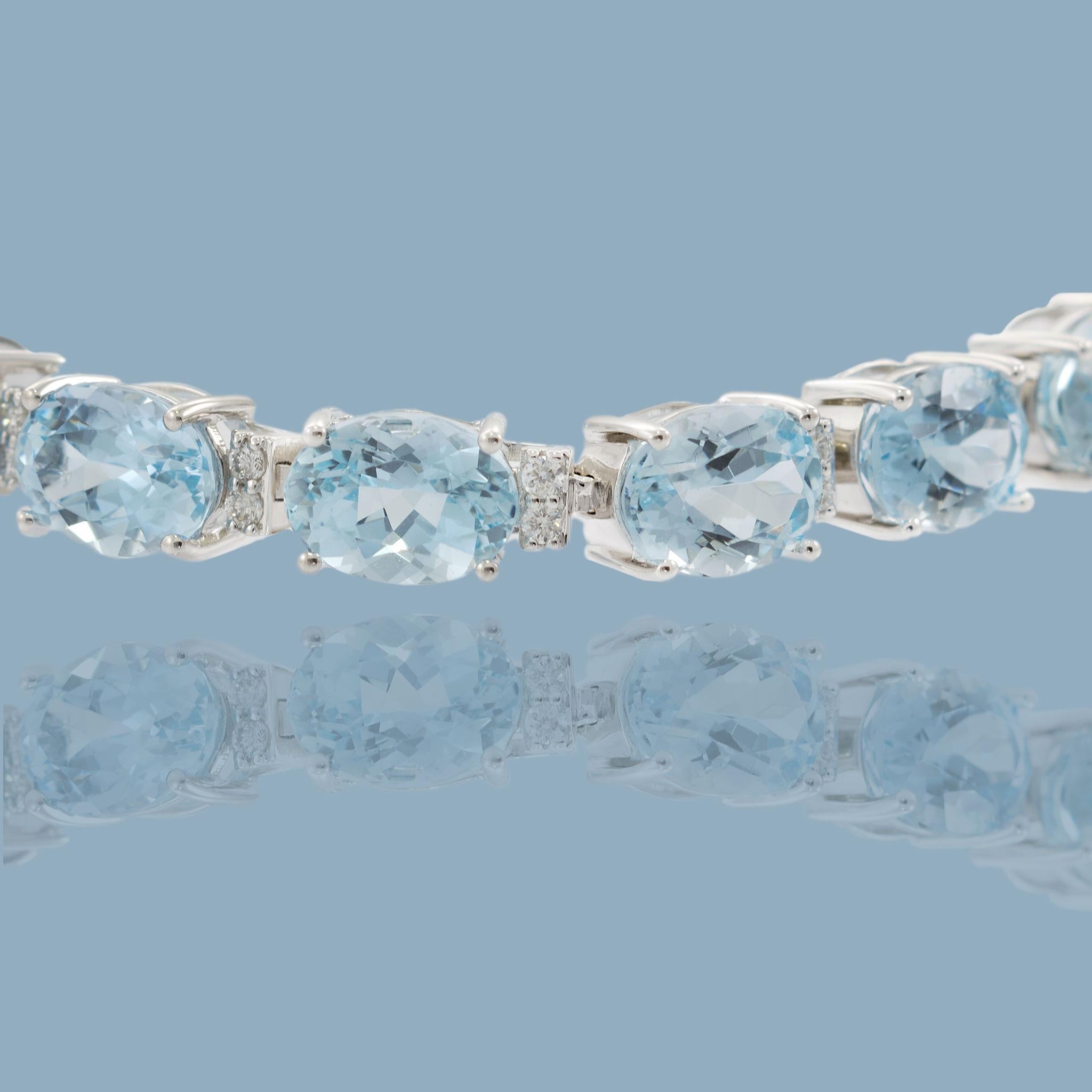 14KT White Gold Aquamarine and Diamond Tennis Bracelet