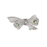 Estate Platinum Art Deco Period Diamond and Garnet Bow Pin