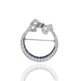 Antique Edwardian Era Platinum Sapphire and Diamond Circle Bow Lapel Pin