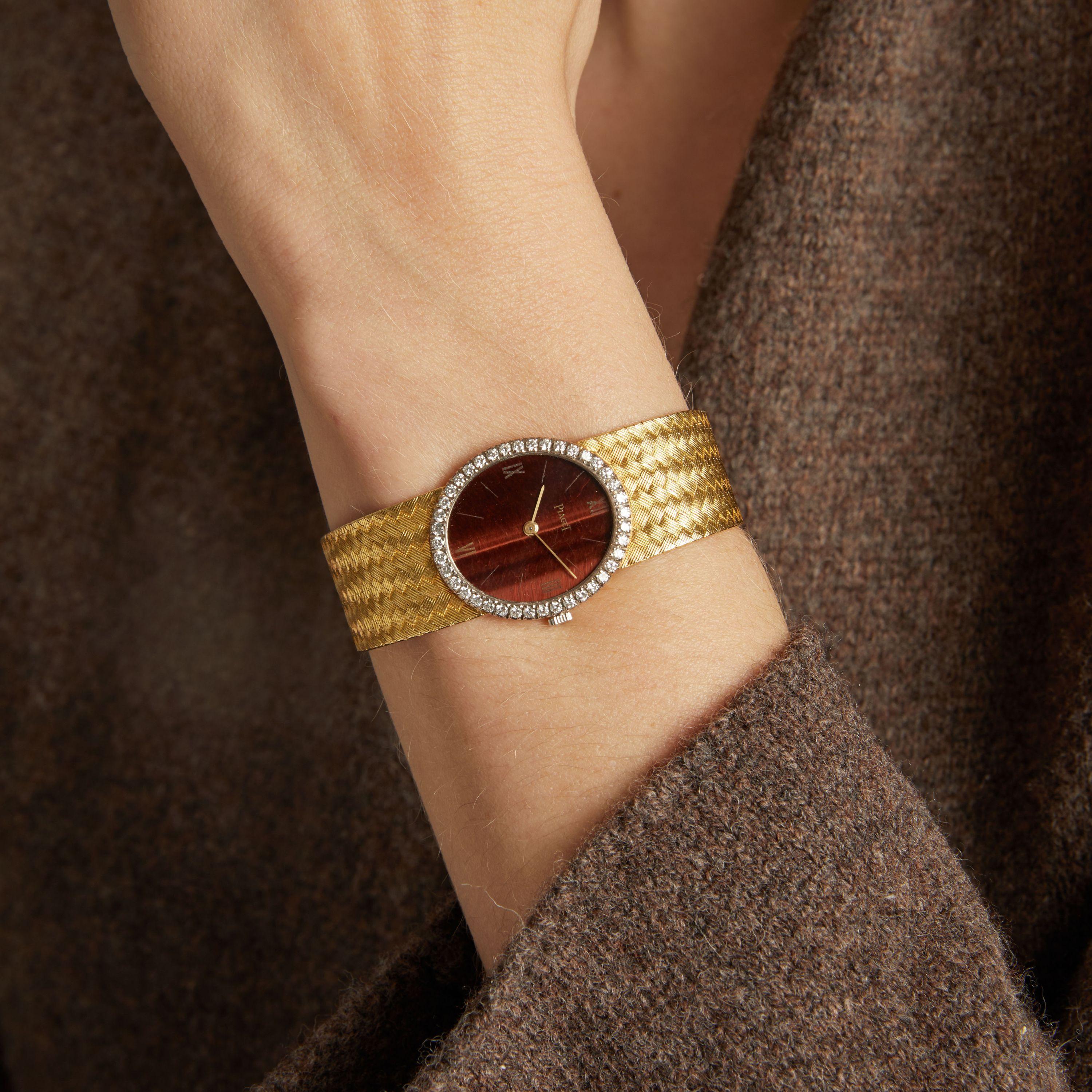 Vintage 1980s Piaget 18KT Yellow Gold Tiger-Eye Dial Diamond Bezel Watch