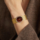 Vintage 1980s Piaget 18KT Yellow Gold Tiger-Eye Dial Diamond Bezel Watch