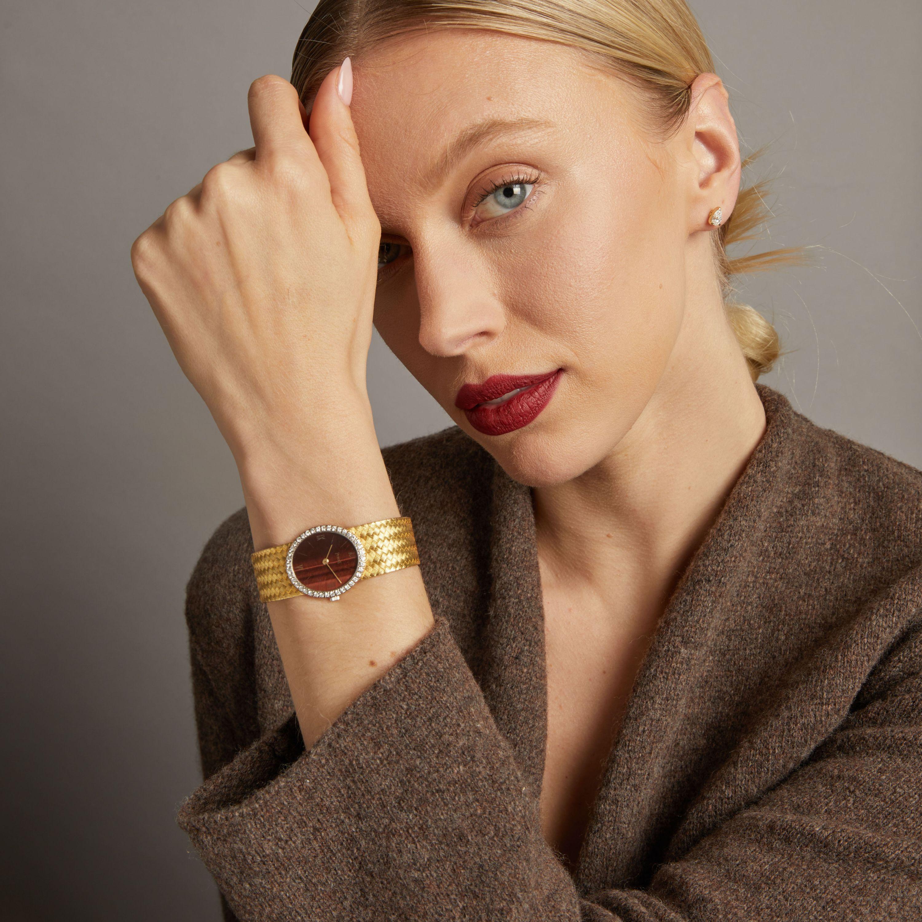Vintage 1980s Piaget 18KT Yellow Gold Tiger-Eye Dial Diamond Bezel Watch