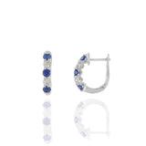 18KT White Gold Huggie Earrings with Alternating Round Cut Diamonds and Blue Sapphires