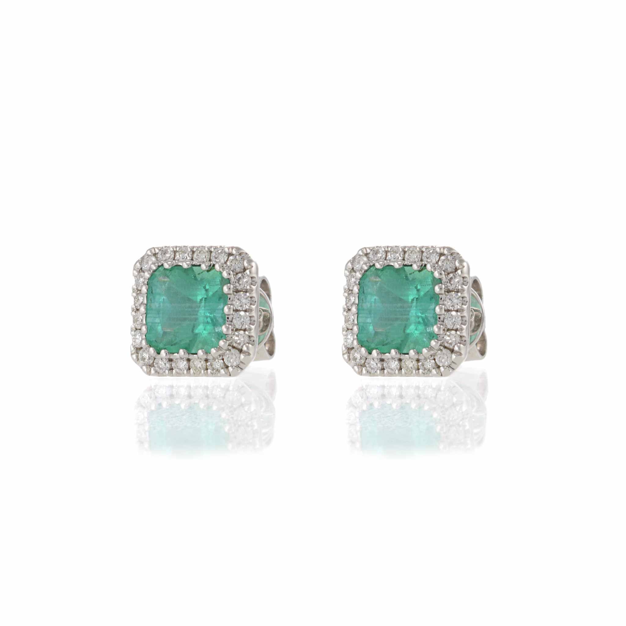 14KT White Gold Emerald and Diamond Halo Earrings