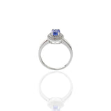 14KT White Gold Oval Tanzanite And Diamond Halo Ring