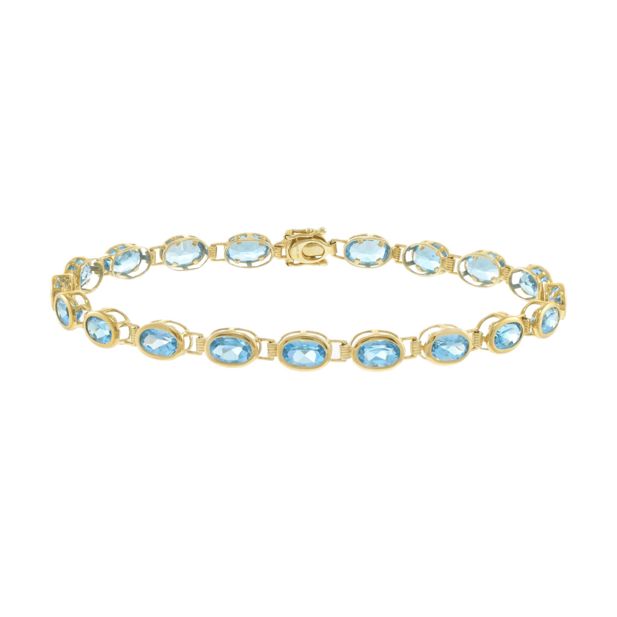 14KT Yellow Gold Bezel Set Oval Blue Topaz Bracelet