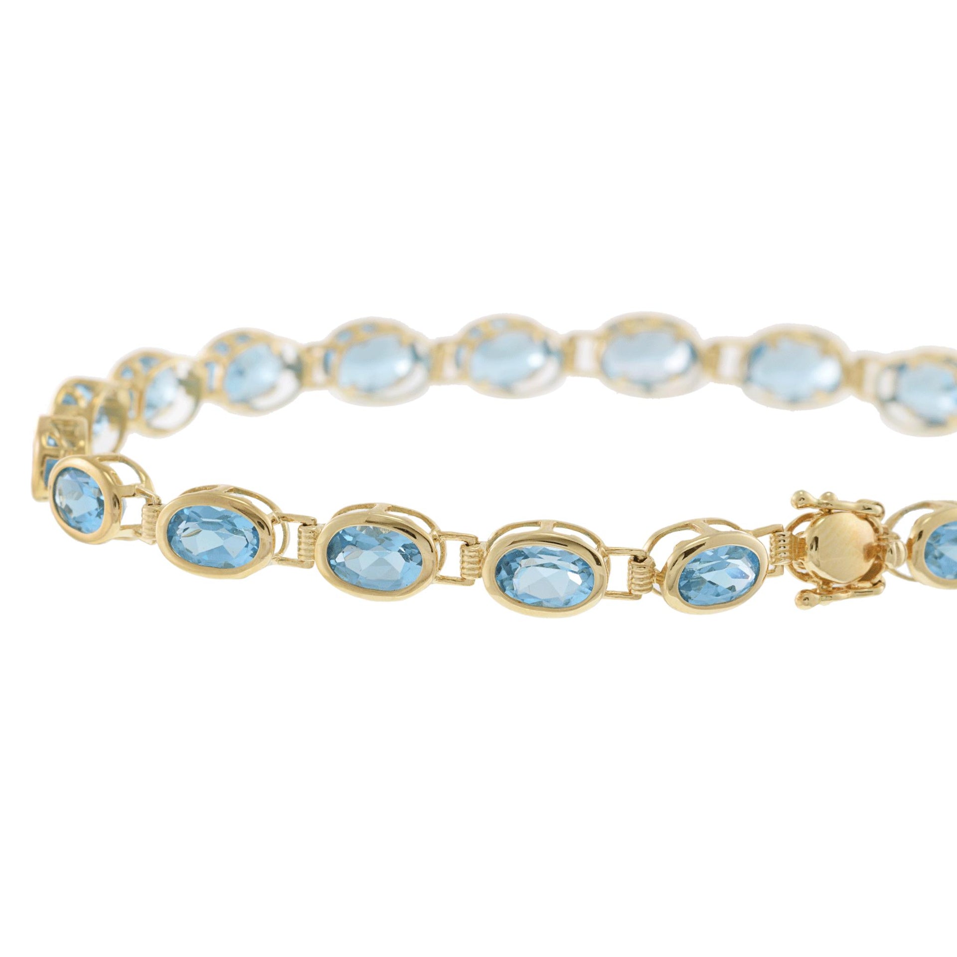 14KT Yellow Gold Bezel Set Oval Blue Topaz Bracelet