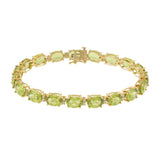 14KT Yellow Gold Bracelet with Oval Peridots and Round Cut Diamonds