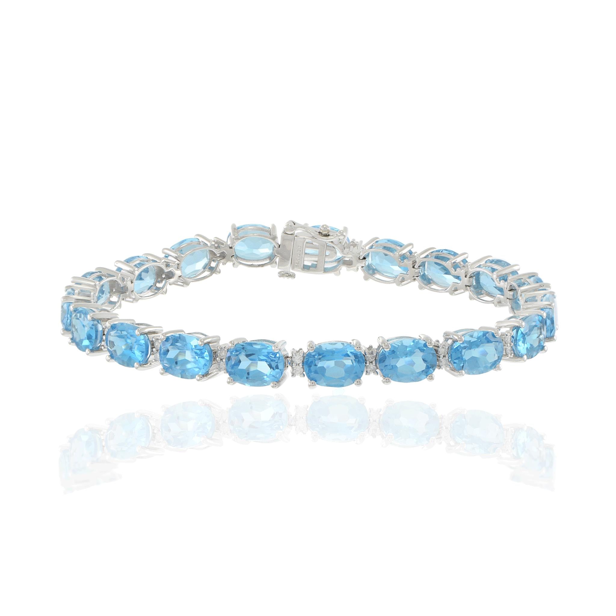 14KT White Gold Oval Blue Topaz and Diamond Bracelet