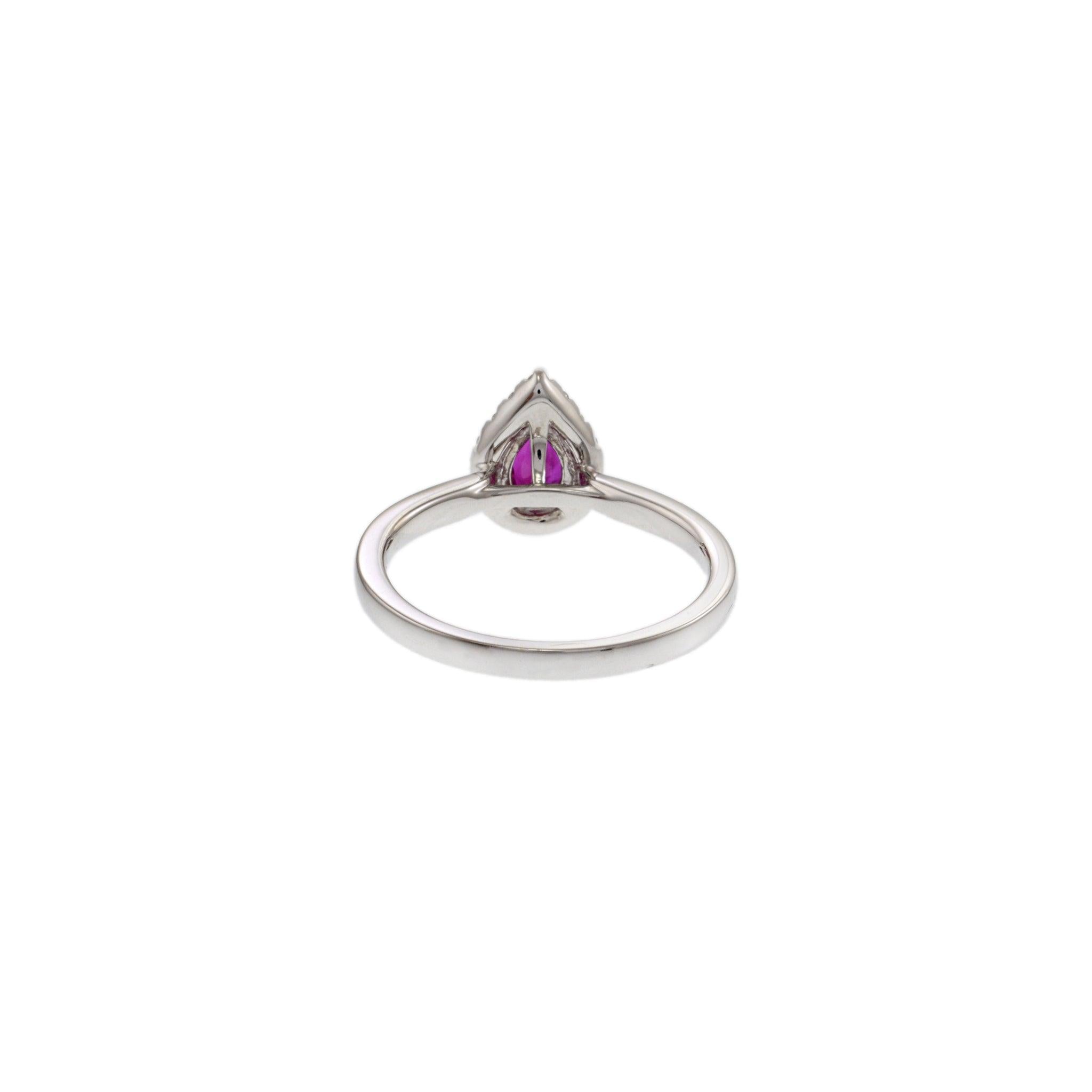 18KT White Gold Pear Ruby and Diamond Halo Ring