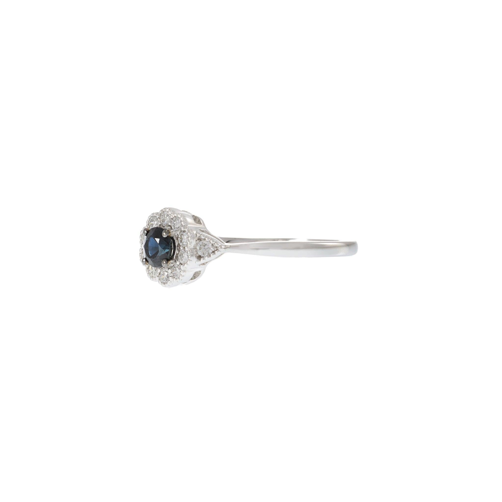 14KT White Gold Round Cut Diamond and Sapphire Flower Ring