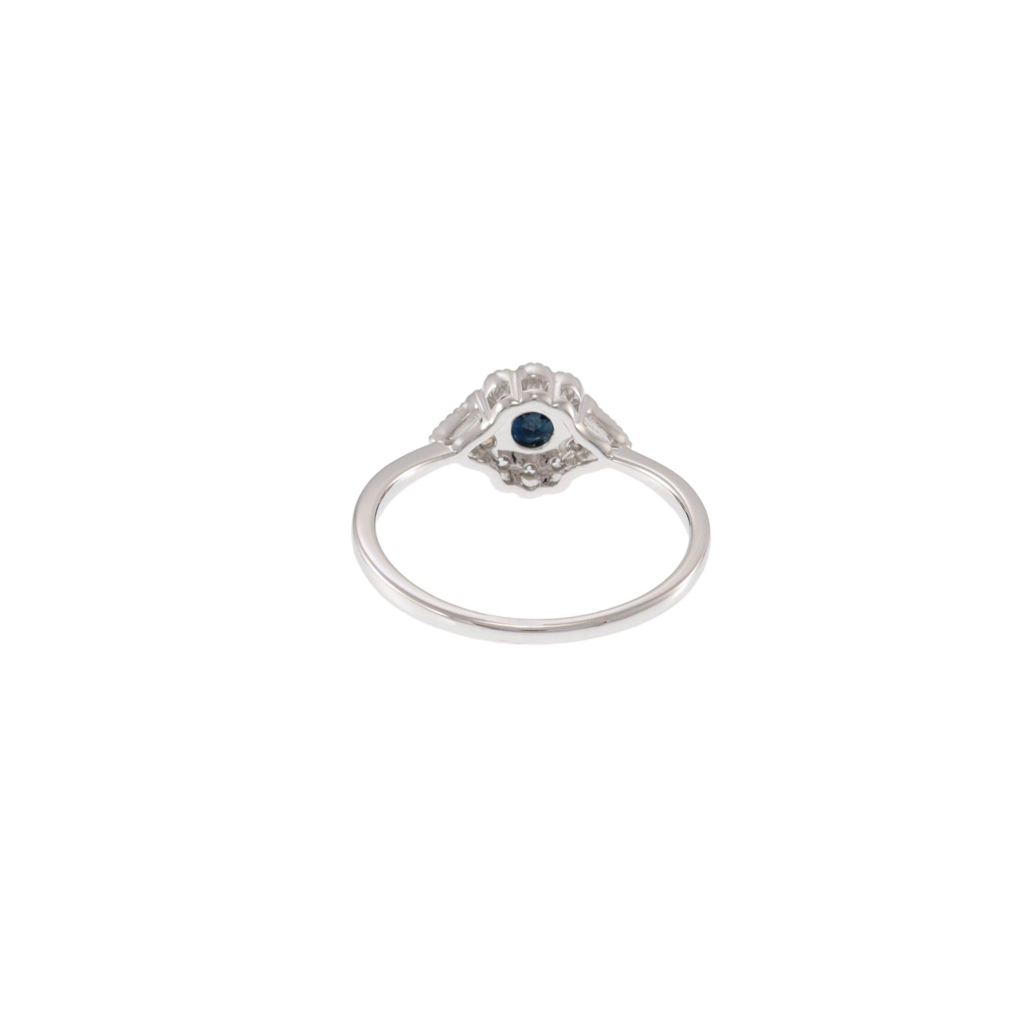 14KT White Gold Round Cut Diamond and Sapphire Flower Ring