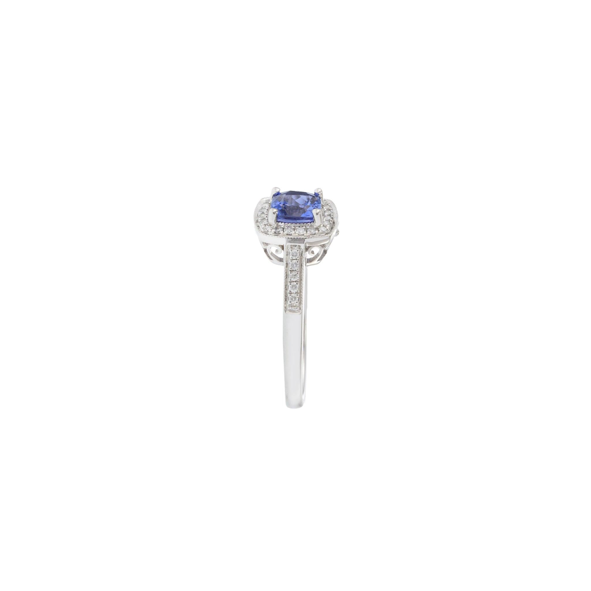14KT White Gold Tanzanite and Diamond Halo Ring