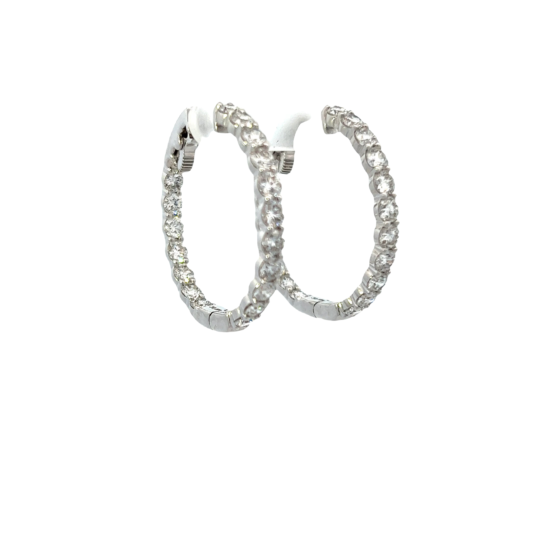 14KT WHITE GOLD AND ROUND CUT DIAMOND IN AND OUT HOOP EARRING.
