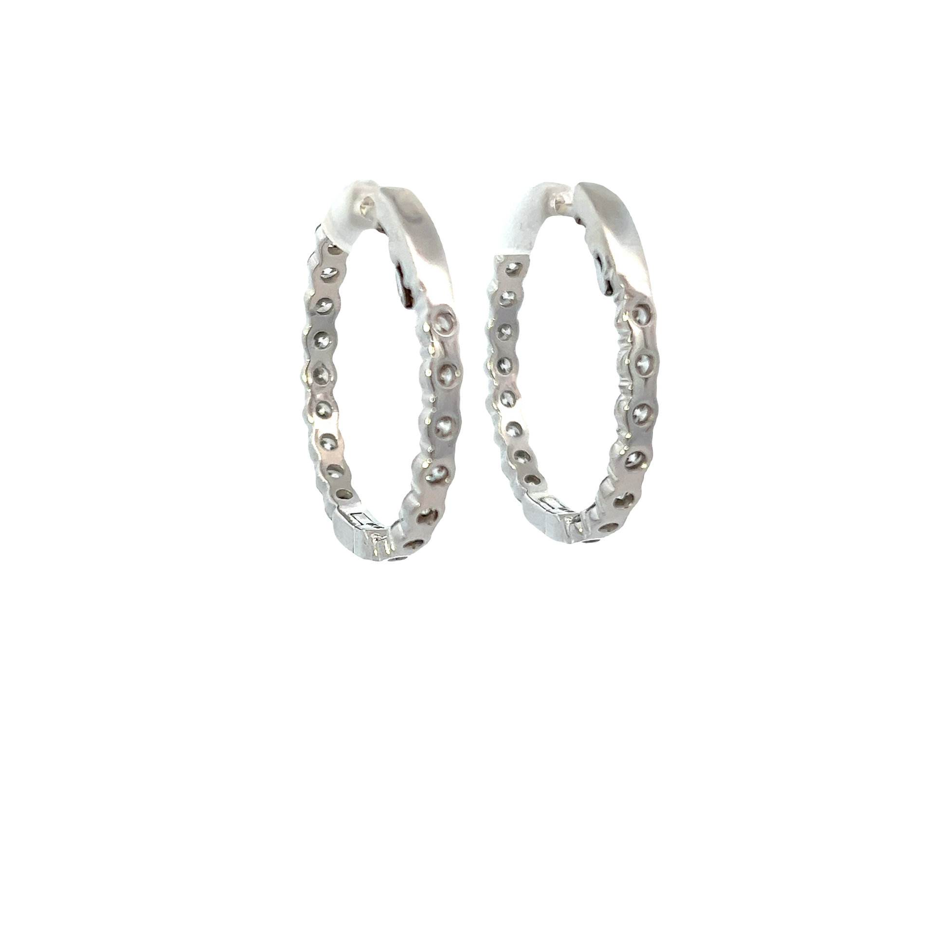 14KT WHITE GOLD AND ROUND CUT DIAMOND IN AND OUT HOOP EARRING.