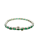 14KT White Gold Round Cut Diamond And Oval Emerald Bracelet