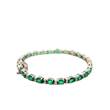 14KT White Gold Round Cut Diamond And Oval Emerald Bracelet