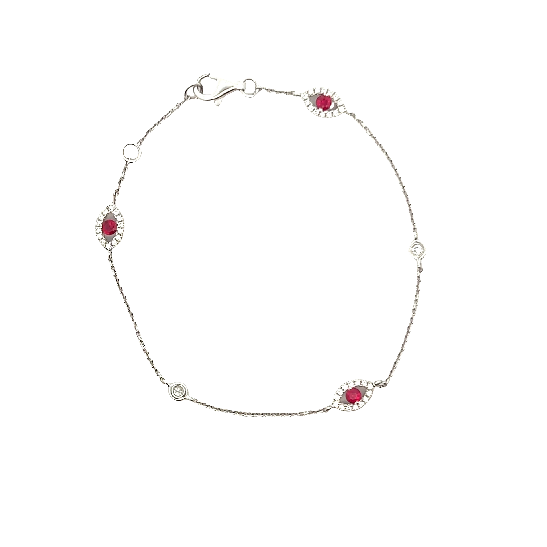 18KT WHITE GOLD, ROUND CUT DIAMOND AND RUBY CHAIN BRACELET.