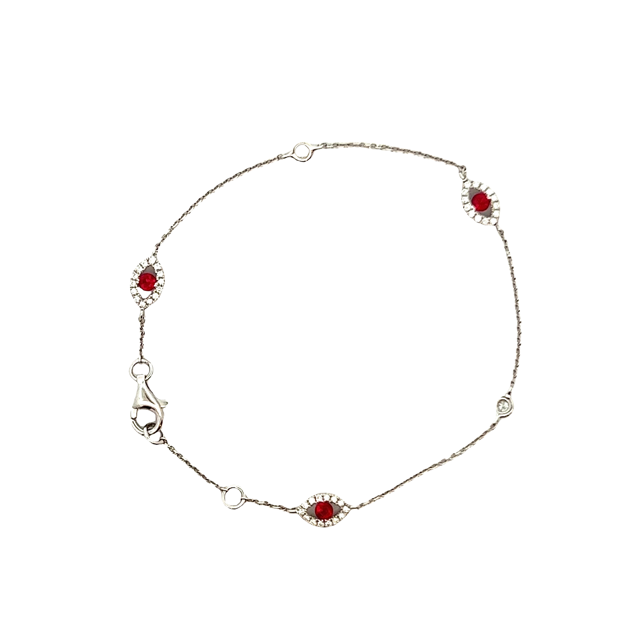 18KT WHITE GOLD, ROUND CUT DIAMOND AND RUBY CHAIN BRACELET.
