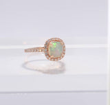 14KT Rose Gold Opal & Diamond Halo Ring