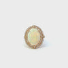 14KT Yellow Gold Large Oval Opal Set With Double Halo Ring