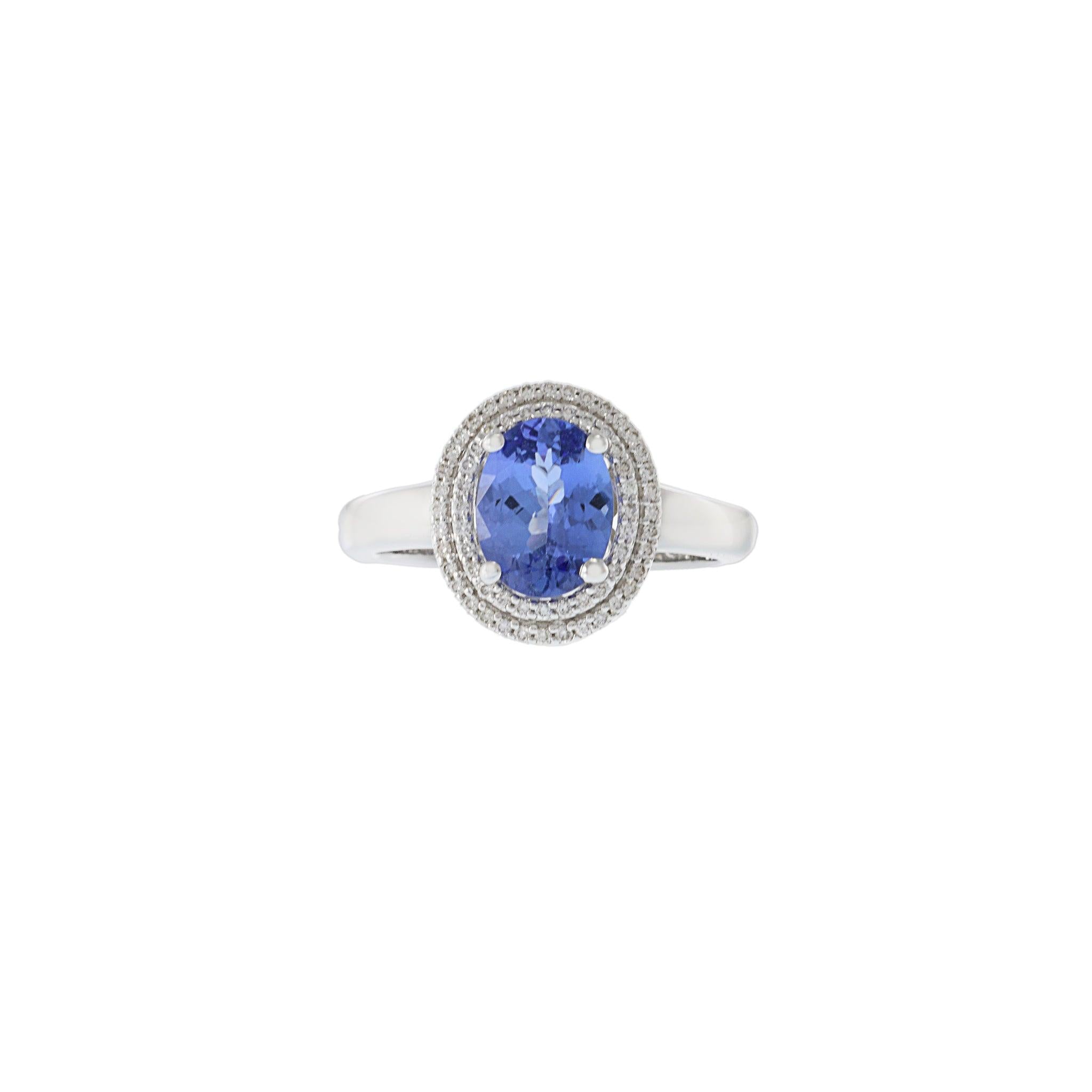14KT White Gold Tanzanite and Diamond Halo Ring