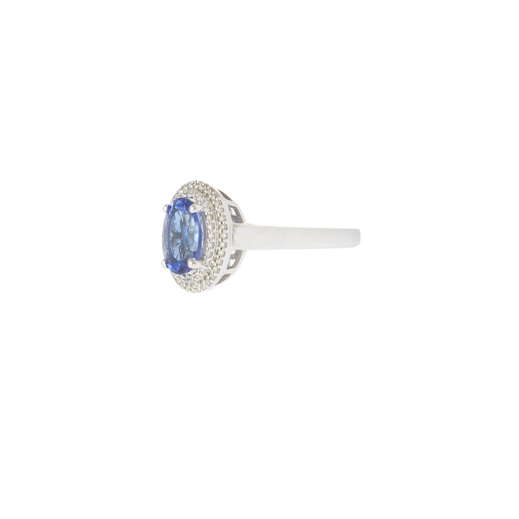 14KT White Gold Tanzanite and Diamond Halo Ring