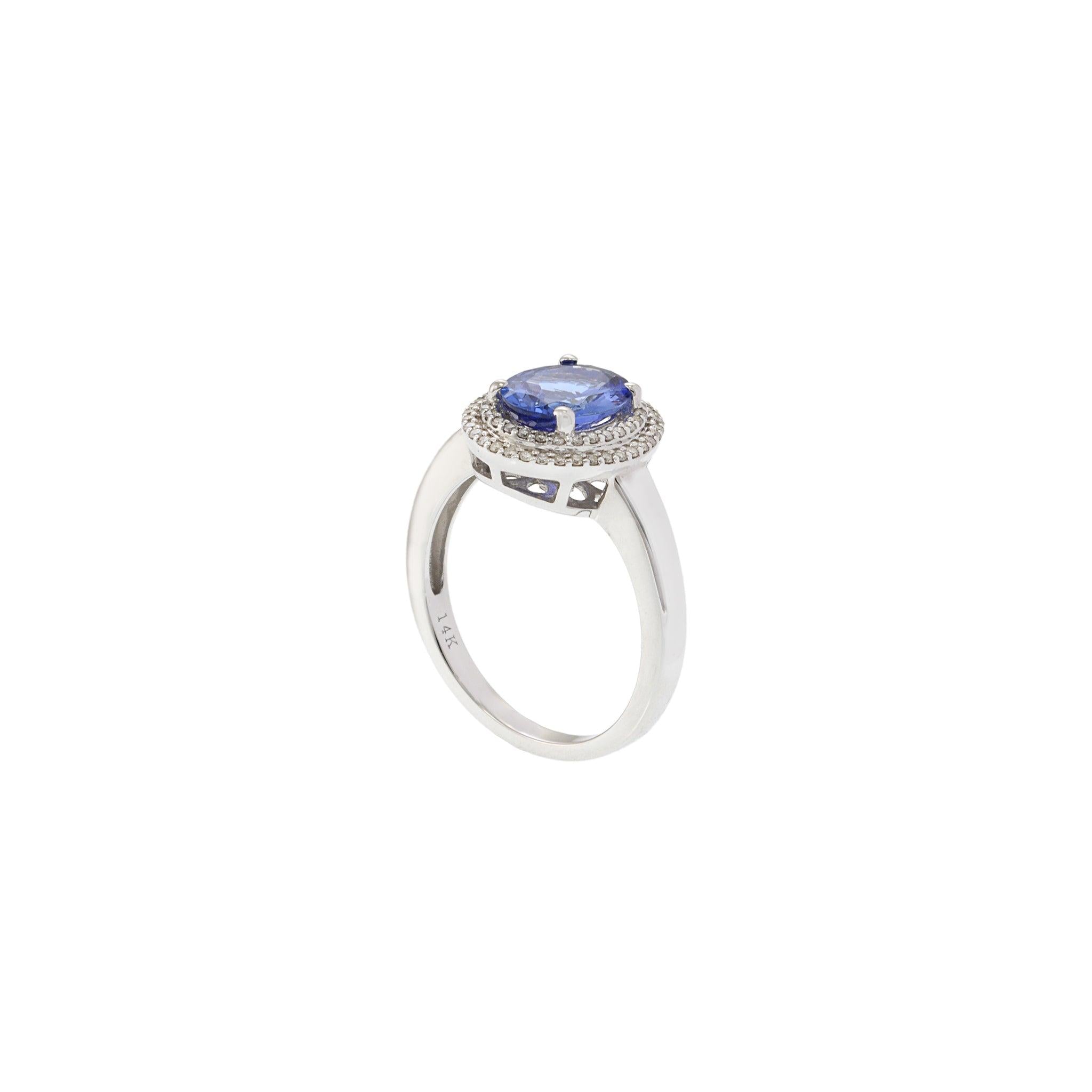14KT White Gold Tanzanite and Diamond Halo Ring