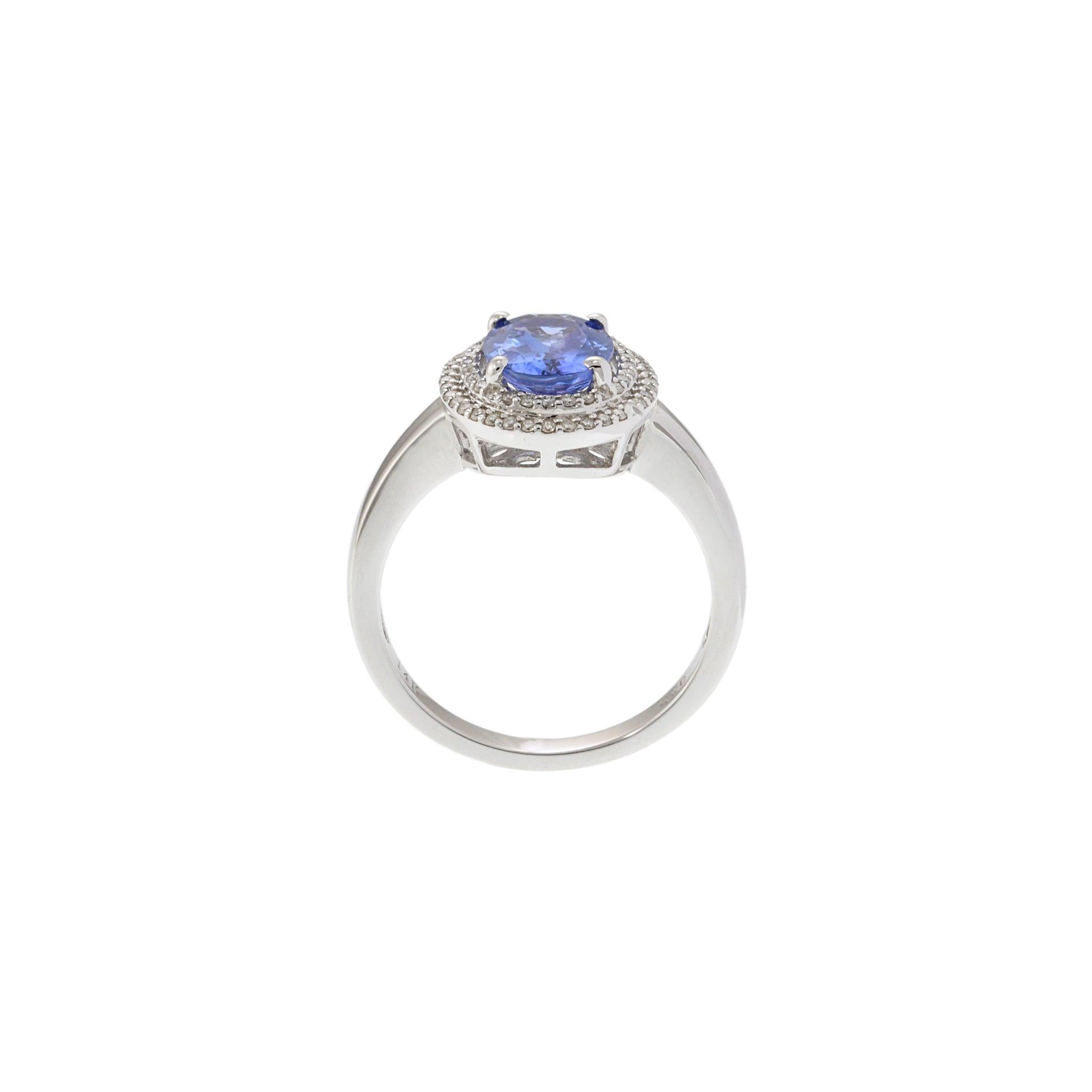 14KT White Gold Tanzanite and Diamond Halo Ring