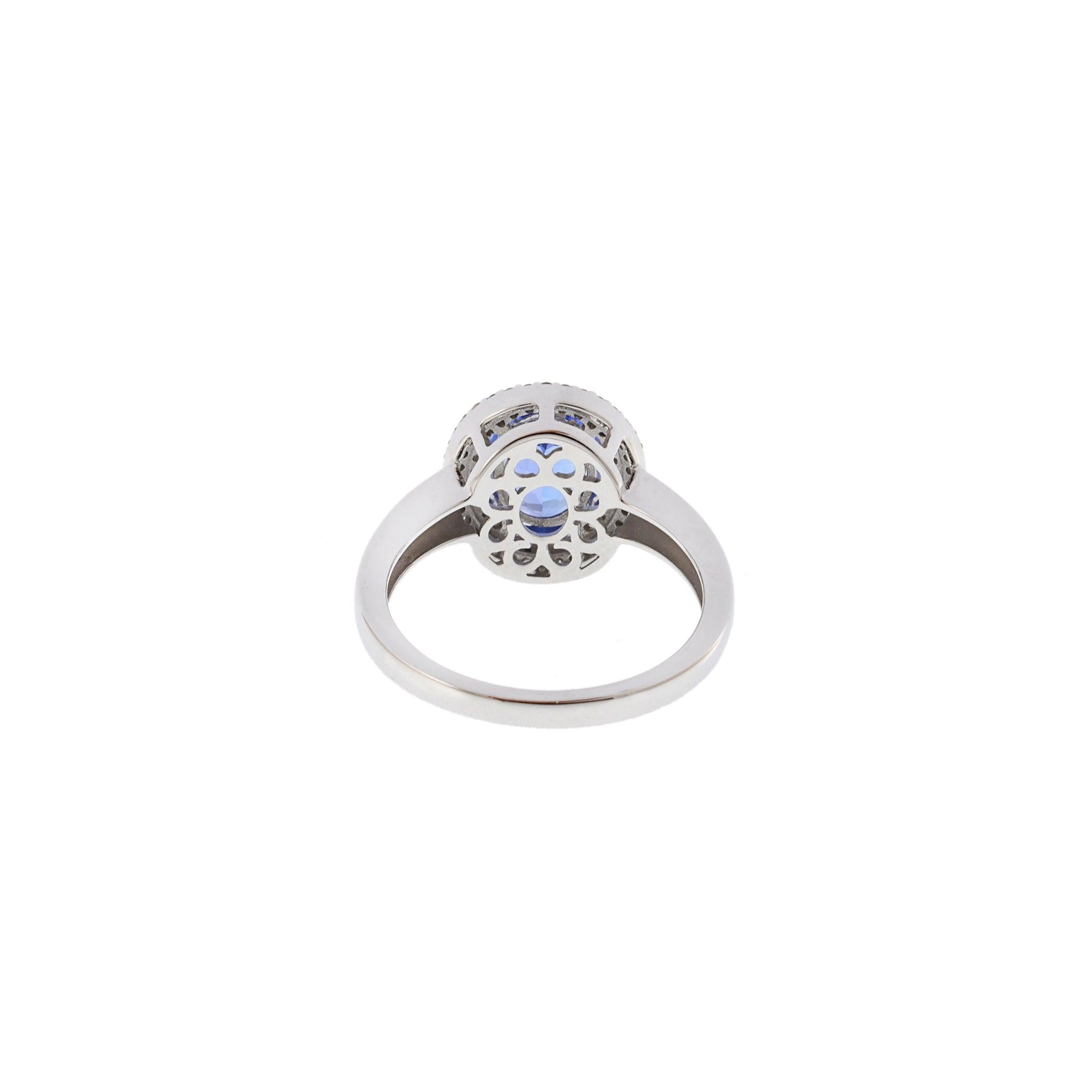 14KT White Gold Tanzanite and Diamond Halo Ring