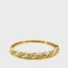 14KT Yellow Gold And Round Cut Diamonds Twisted Gold Bangle