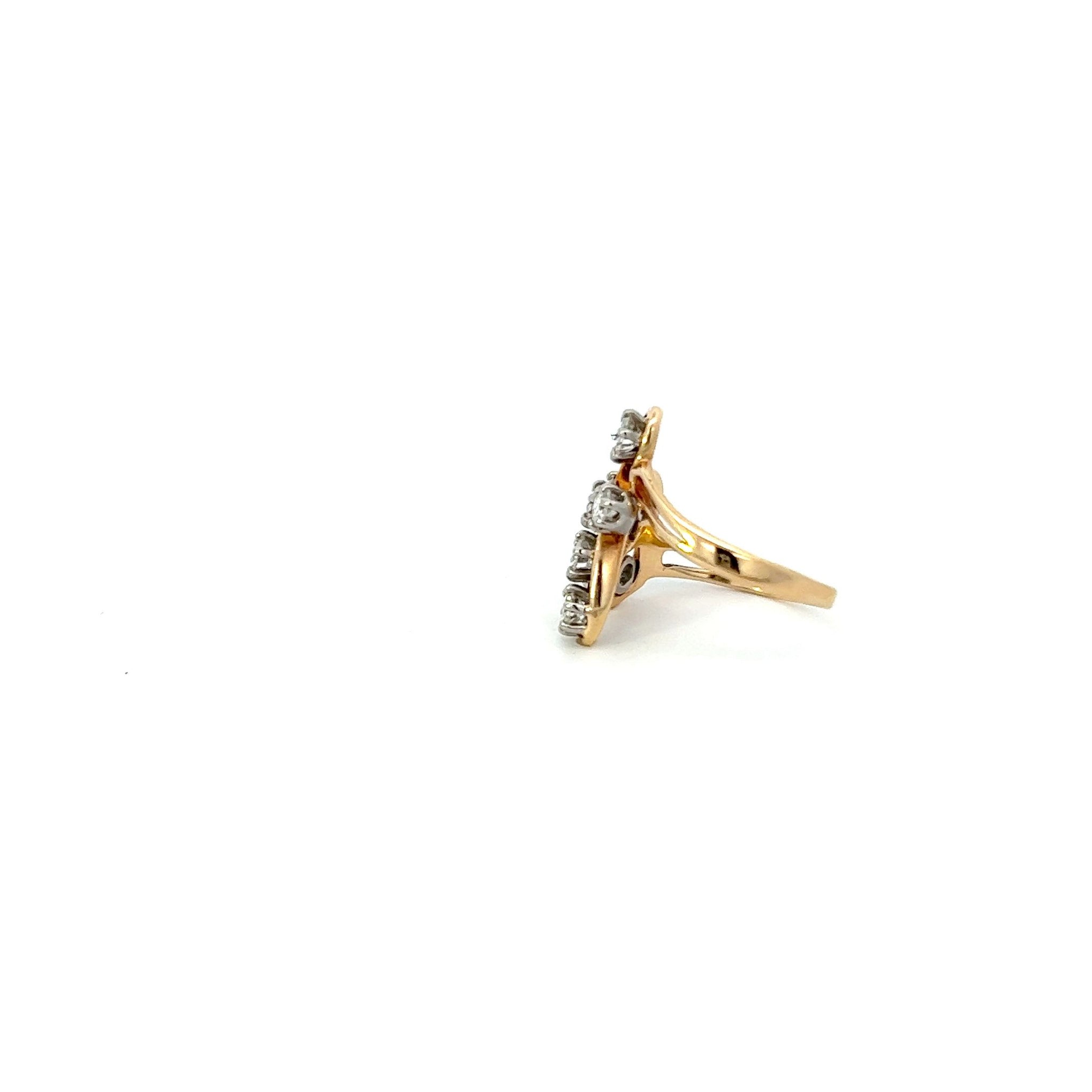 VINTAGE, 14KT YELLOW GOLD AND 7 ROUND CUT DIAMOND RING.