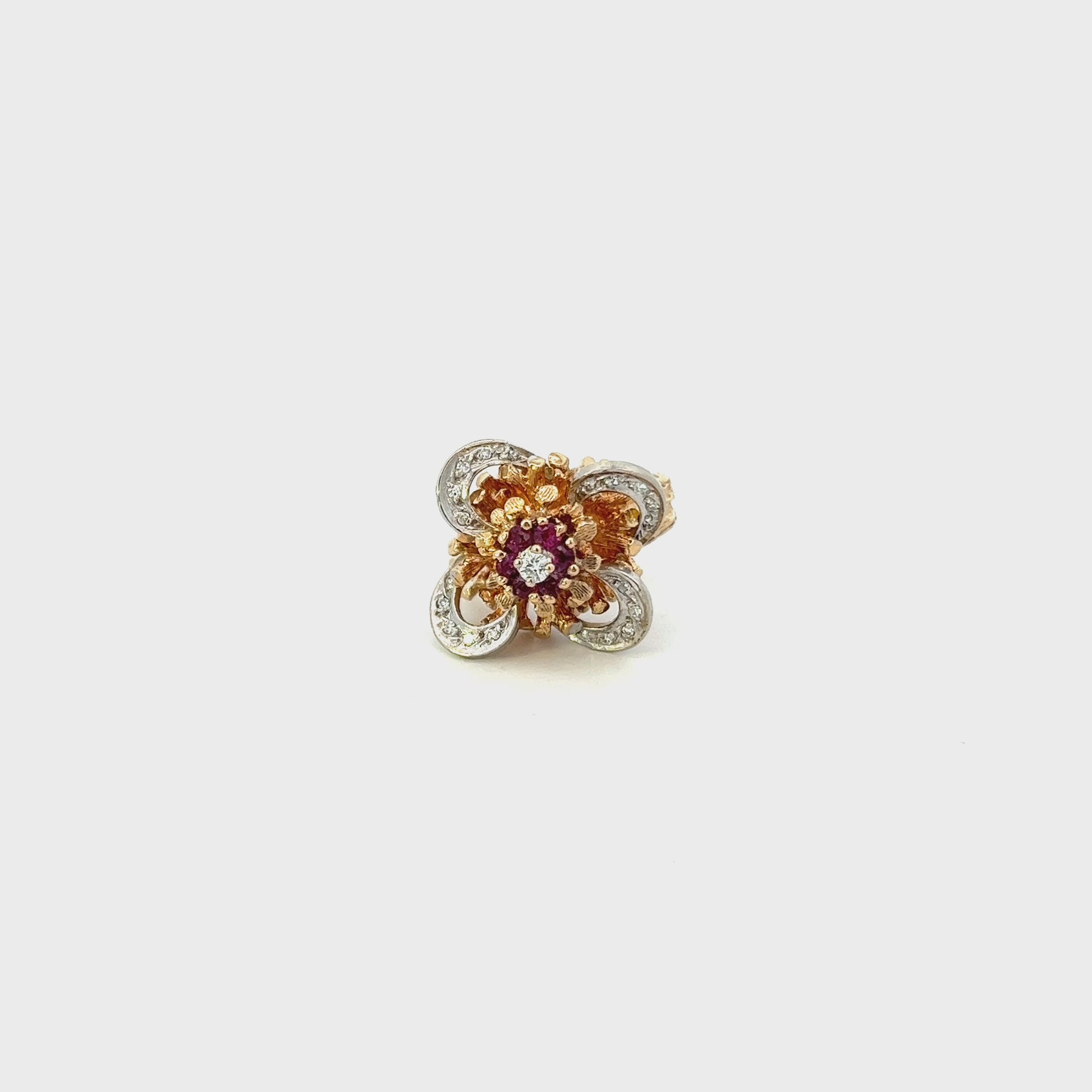 VINTAGE, 14KT ROUND CUT DIAMOND AND RUBY FANCY FLOWER RING.